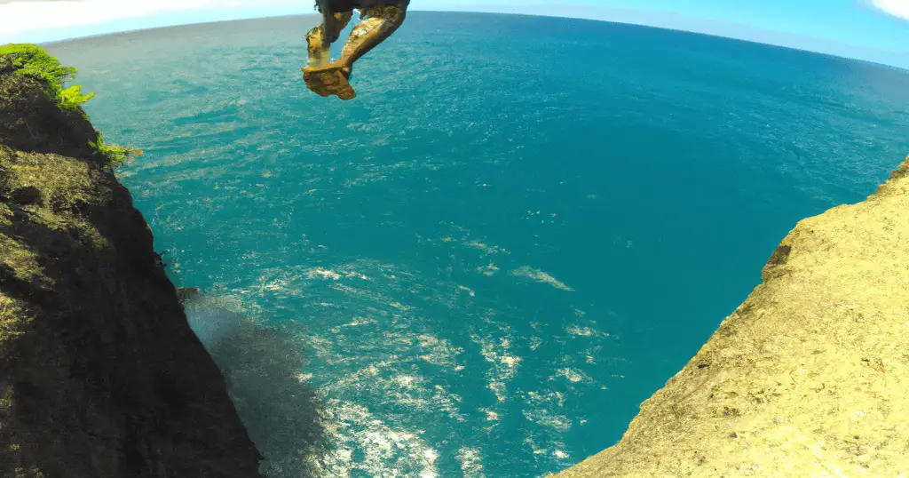 Edited GoPro photo of person jumping Leap of Faith cliff jump